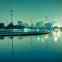 Naklejka premium City at night with reflection of skyline,Vintage tone