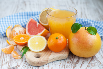 Citrus fruits and fresh orange juice