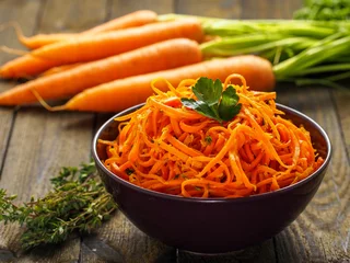 Fotobehang Gerechten Delicious carrot  salad with fresh herbs