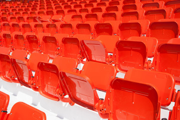 Naklejka premium empty, red stadium seats
