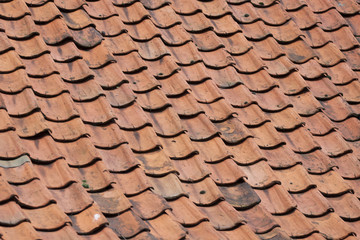 Old orange roof tiles.
