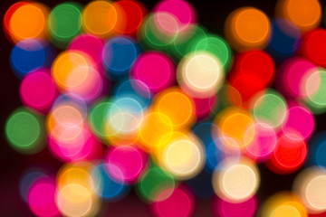 Round multicolor bokeh on a black background