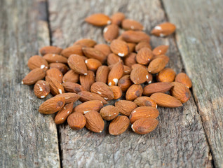 almonds on wooden surface