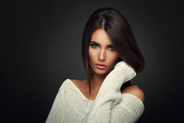 beautiful woman in white sweater