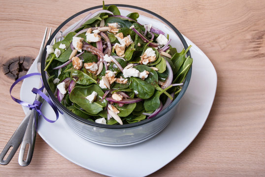 Spinach and cheese salad with balsamic dressing