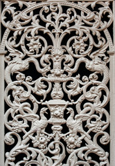 Old forged decorative iron railing with ornament on a door