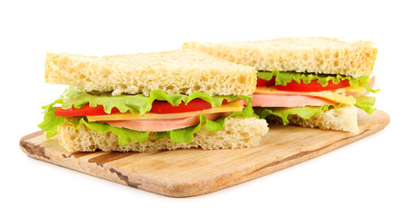 Fresh and tasty sandwiches on cutting board isolated on white