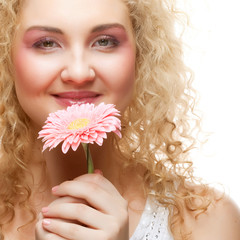 Beautiful woman with  pink flower