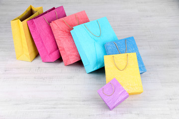 Obraz na płótnie Canvas Colorful shopping bags, on light background