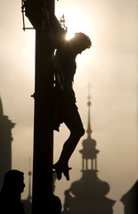 Fototapeta premium Prague - cross on the charles bridge - silhouette