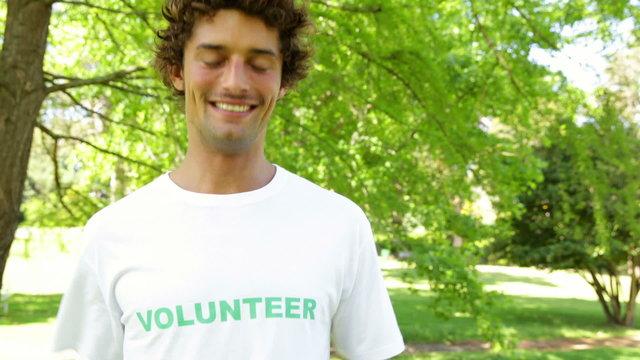 Handsome volunteer smiling at the camera