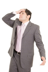 hispanic stressed businessman in suit
