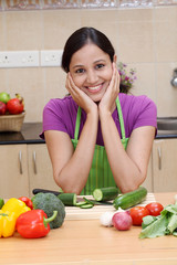 Beautiful young woman in kitchen