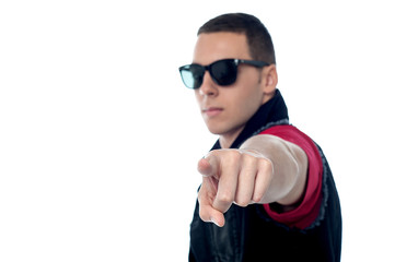 Smart guy pointing towards camera