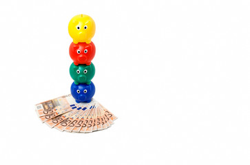 Vier Sparschweine und Euros