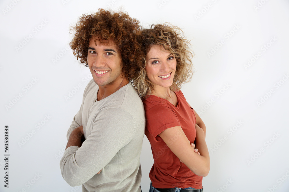 Wall mural Modern couple standing on white background