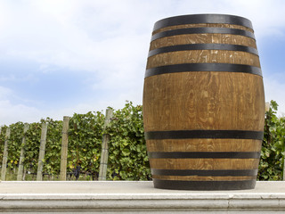 Naklejka premium Wine barrel in front of the vineyard