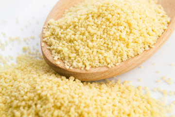 couscous in wooden spoon