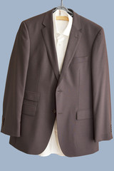 Suit and shirt on hanger