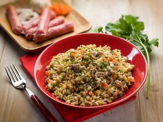 rice with sausage, selective focus