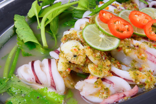 Thai food name is Steamed squid with lemon