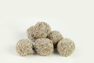 Sweet chocolate balls with coconut isolated on white