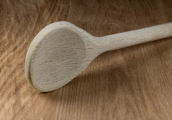 The Wooden spoon lying on a table