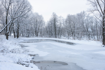 not frozen pond in winter