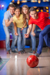 Fototapeta na wymiar Group of friends bowling.