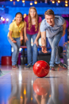 Group of friends bowling.