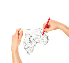 Hands drawing big house on a white
