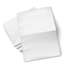 Blank newspapers pile on white background.