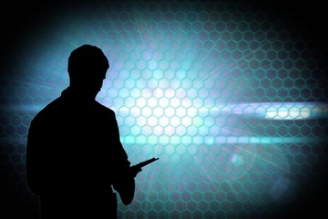 Composite image of black background with shiny hexagons