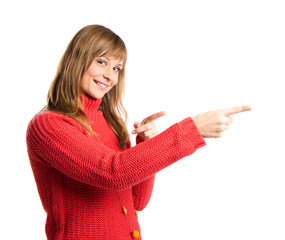 Young pretty woman pointing over white background