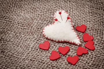 Valentine background with hand-sewn hearts