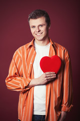 Smiling man with heart shape.