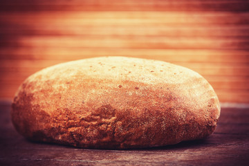 Delicious bread on a wood table