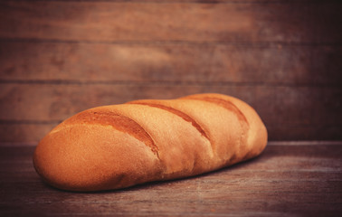 Delicious bread on a wood table