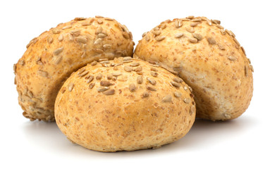 Round sandwich bun with sunflower seeds isolated on white backgr