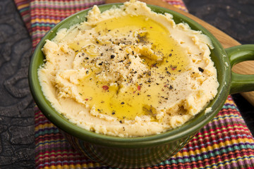 A bowl of creamy hummus