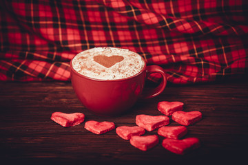 Cup of coffee and heart shaped cookies