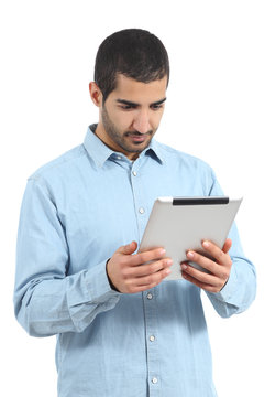 Arab saudi man reading a tablet reader isolated