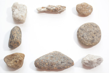 Fototapeta na wymiar Stones arranged into a frame