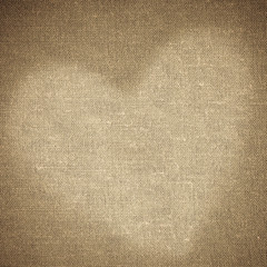 Valentine's day background. Heart shape design on brown canvas