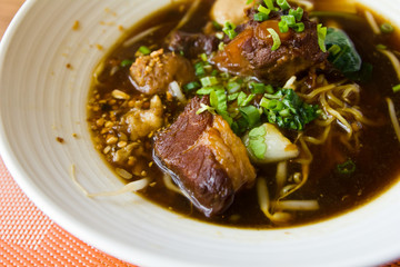 spicy black spaghetti on plate