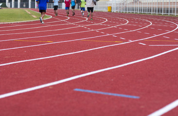 man ready to start running on running track