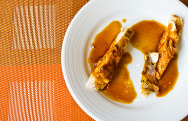 chicken with sauce on plate