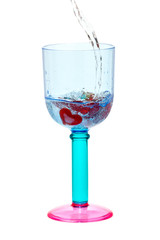 Hearts in glass with pour soda