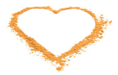 Heart of orange cinnamon isolated on white background