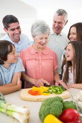 Family preparing food at counter